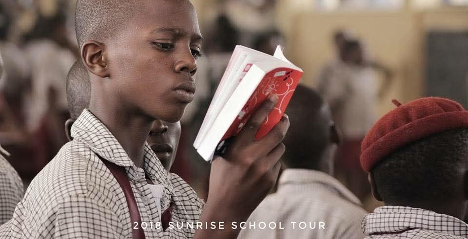 A young man reading a book